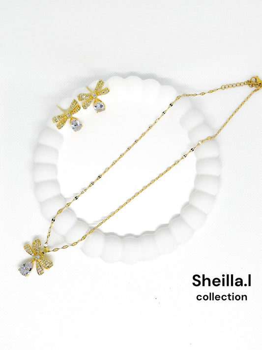 Gold Bow Pendant Necklace & Earring Set